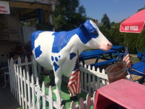Blue and white cow statue