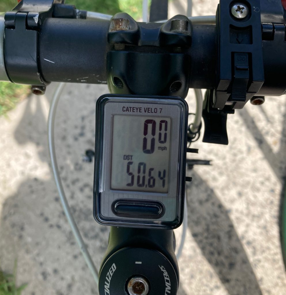 Odometer showing mileage of fifty point six four